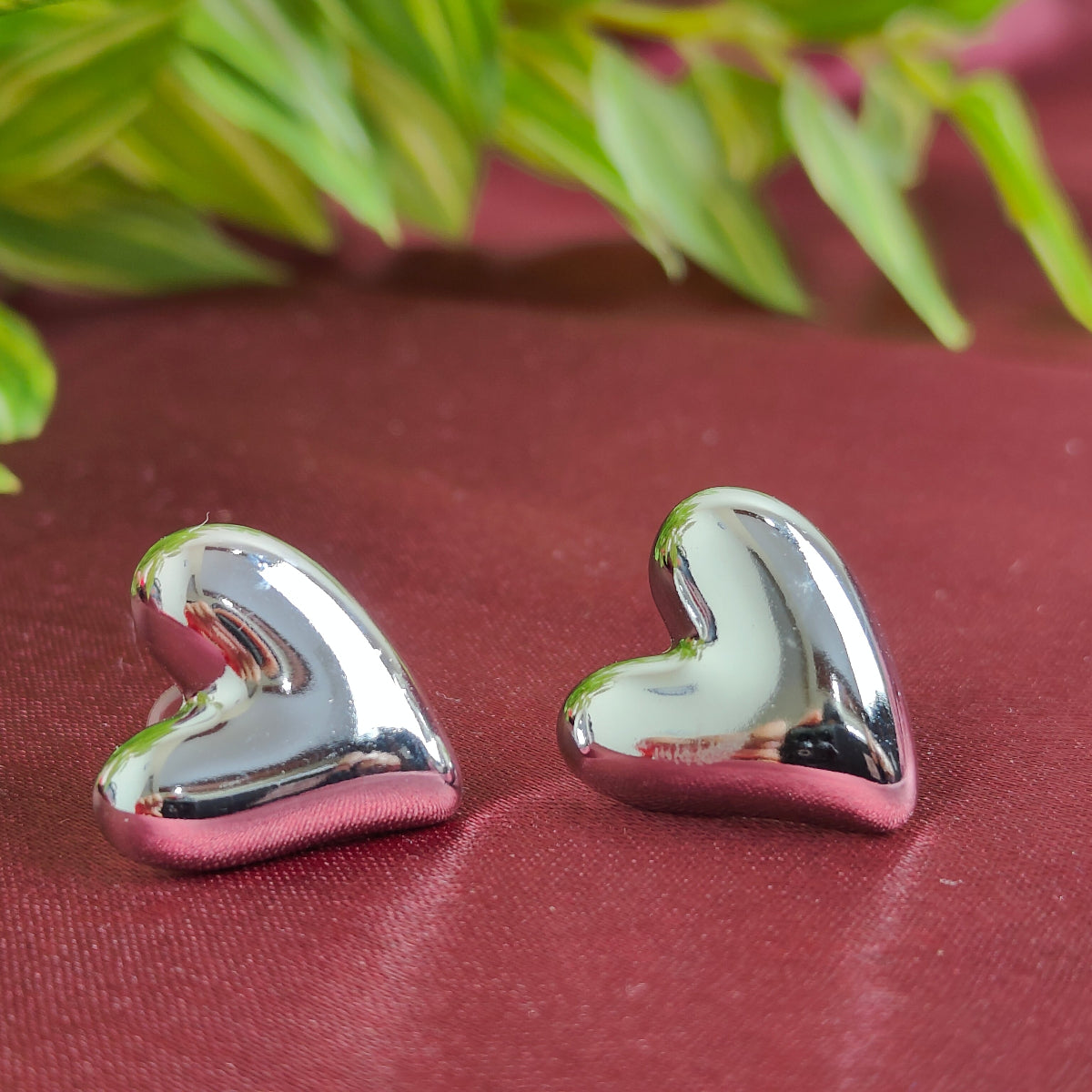 Quirrky Twisted Heart earring- Silver
