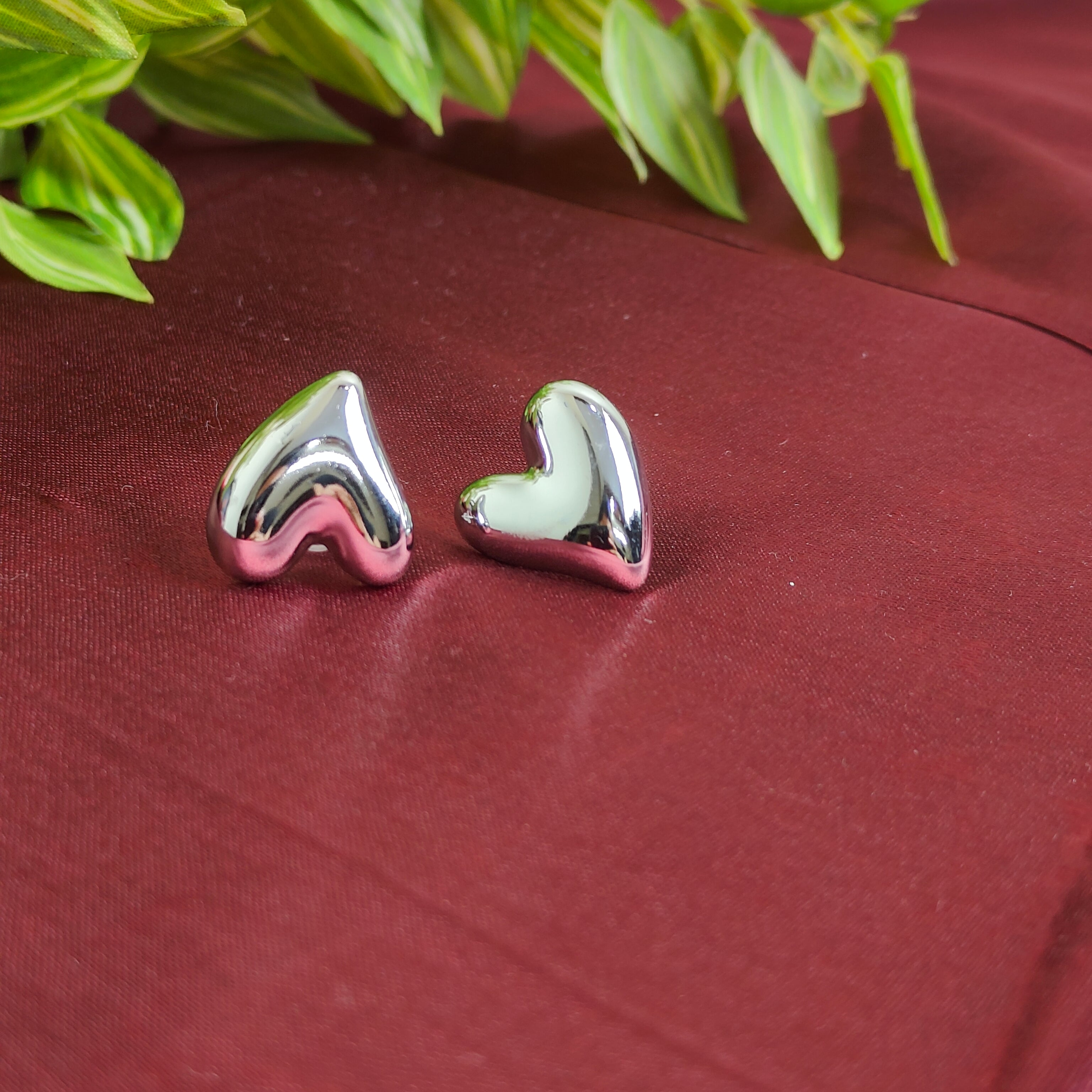 Quirrky Twisted Heart earring- Silver