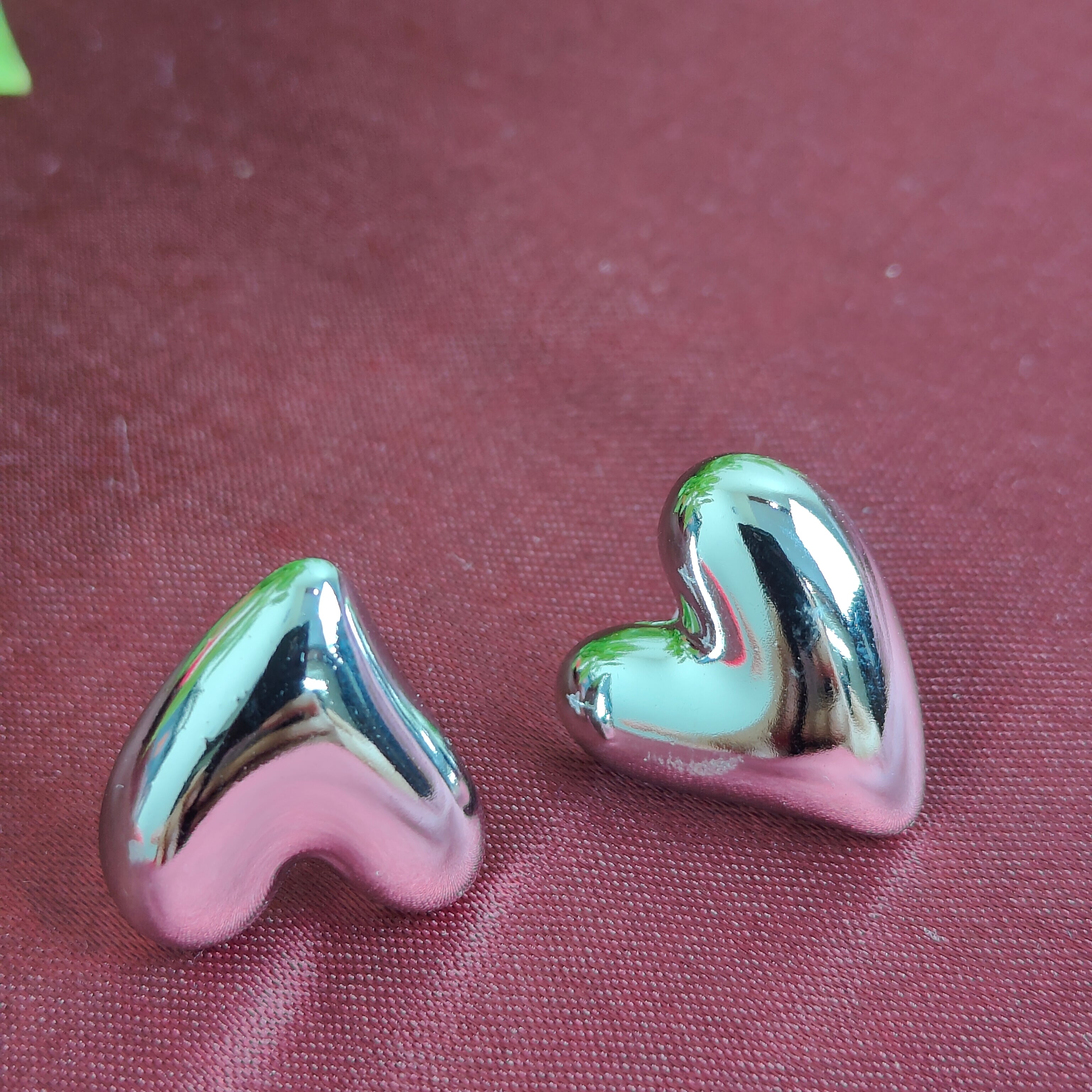 Quirrky Twisted Heart earring- Silver